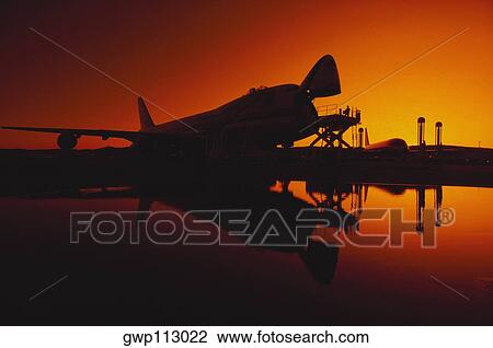 Silhouette of a jet fighters, Osaka Prefecture, Japan View Large Photo Image Stock Image - Silhouette of a jet fighters, Osaka Prefecture, Japan. Fotosearch