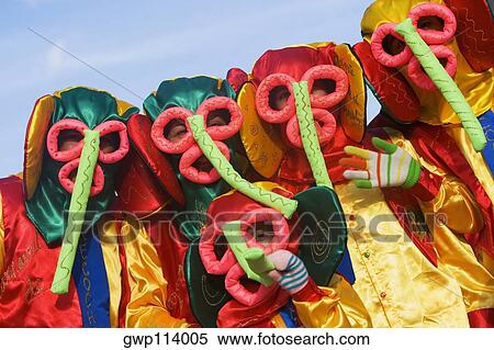 Close-up of a group of people wearing costume View Large Photo Image Stock Photography - Close-up of a group of people wearing costume. Fotosearch