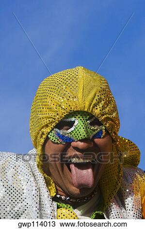 Close-up of a man sticking his tongue out View Large Photo Image Stock Image - Close-up of a man sticking his tongue out. Fotosearch
