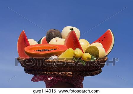 Close-up of assorted fruits in a wicker basket View Large Photo Image Stock Photography - Close-up of assorted fruits in a wicker basket. Fotosearch