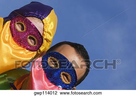 Close-up of two men wearing costumes View Large Photo Image Stock Image - Close-up of two men wearing costumes. Fotosearch