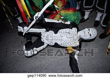 High angle view of a man wearing costume and performing in a traditional festival View Large Photo Image Stock Image - High angle view of a man wearing costume and performing in a traditional festival. Fotosearch