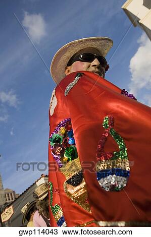Low angle view of a mature man wearing a costume View Large Photo Image Stock Image - Low angle view of a mature man wearing a costume. Fotosearch
