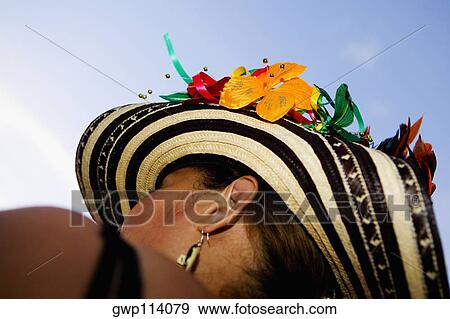 Low angle view of a woman View Large Photo Image Stock Photo - Low angle view of a woman. Fotosearch