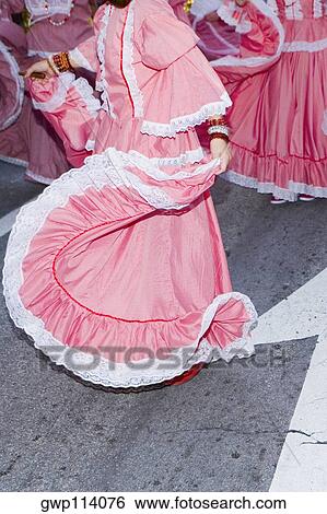 Low section view of women wearing a costume and performing in a traditional festival View Large Photo Image Stock Photograph - Low section view of women wearing a costume and performing in a traditional festival. Fotosearch