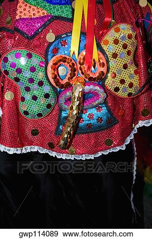 Mid section view of a person wearing a costume View Large Photo Image Stock Photo - Mid section view of a person wearing a costume. Fotosearch