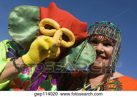 Portrait of a senior woman with an another woman wearing a costume View Large Photo Image Stock Image - Portrait of a senior woman with an another woman wearing a costume. Fotosearch