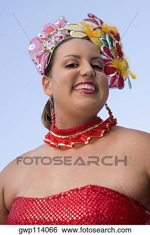 Portrait of a teenage girl wearing a costume in a traditional festival View Large Photo Image Stock Photograph - Portrait of a teenage girl wearing a costume in a traditional festival. Fotosearch