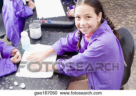 High angle view of a girl with her hands on the table for a manicure View Large Photo Image Stock Image - High angle view of a girl with her hands on the table for a manicure. Fotosearch