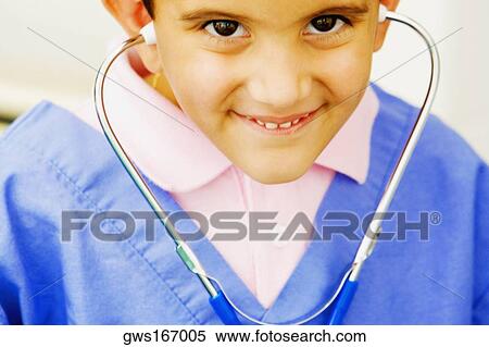 Portrait of a boy imitating a doctor View Large Photo Image Stock Photography - Portrait of a boy imitating a doctor. Fotosearch