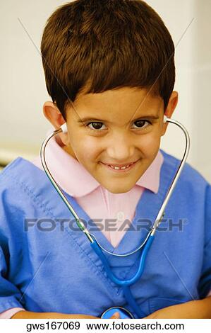 Portrait of a boy listening to his heartbeats with a stethoscope View Large Photo Image Stock Photo - Portrait of a boy listening to his heartbeats with a stethoscope. Fotosearch