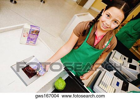 Portrait of a girl holding disposable cups at the checkout counter View Large Photo Image Picture - Portrait of a girl holding disposable cups at the checkout counter. Fotosearch