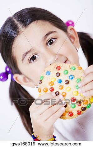 Portrait of a girl holding a pie View Large Photo Image Stock Photo - Portrait of a girl holding a pie. Fotosearch