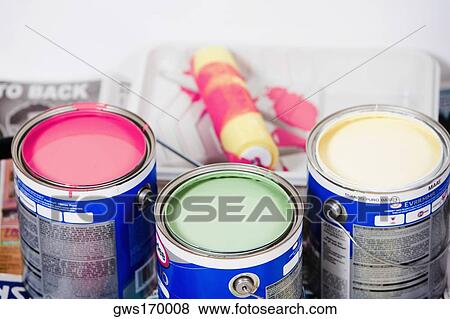 Close-up of paint cans with a paint roller View Large Photo Image Stock Photo - Close-up of paint cans with a paint roller. Fotosearch