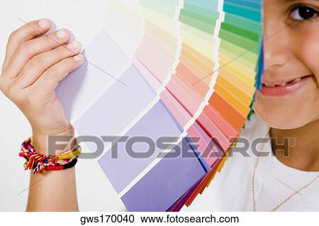 Portrait of a girl holding color swatches View Large Photo Image Stock Image - Portrait of a girl holding color swatches. Fotosearch