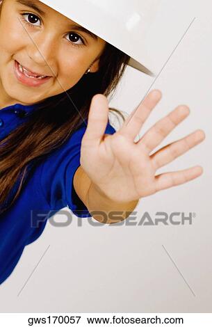 Portrait of a girl making a stop hand gesture View Large Photo Image Stock Photo - Portrait of a girl making a stop hand gesture. Fotosearch