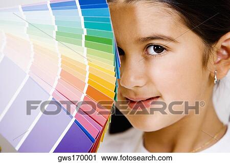 Portrait of a girl with color swatches in front of her face View Large Photo Image Stock Image - Portrait of a girl with color swatches in front of her face. Fotosearch