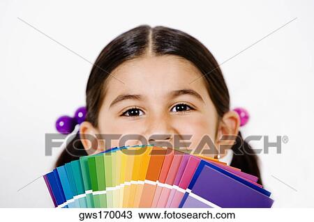 Portrait of a girl with color swatches in front of her face View Large Photo Image Stock Image - Portrait of a girl with color swatches in front of her face. Fotosearch