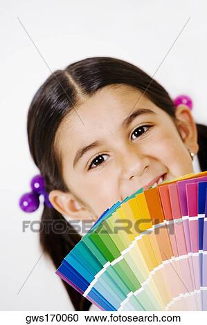 Portrait of a girl with color swatches in front of her face View Large Photo Image Stock Image - Portrait of a girl with color swatches in front of her face. Fotosearch