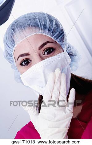 Portrait of a female surgeon wearing scrubs View Large Photo Image Stock Photo - Portrait of a female surgeon wearing scrubs. Fotosearch