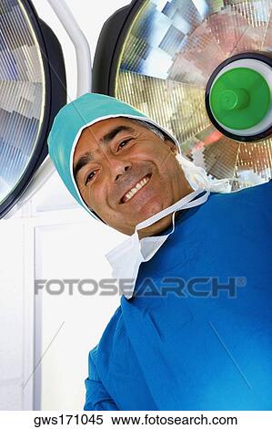 Portrait of a male surgeon smiling View Large Photo Image Stock Photography - Portrait of a male surgeon smiling. Fotosearch