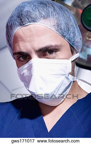 Stock Photo - Portrait of a male surgeon. Fotosearch