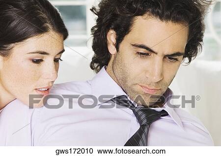 Close-up of a businessman and a businesswoman View Large Photo Image Stock Image - Close-up of a businessman and a businesswoman. Fotosearch