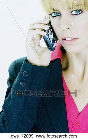Portrait of a businesswoman talking on a mobile phone View Large Photo Image Stock Photo - Portrait of a businesswoman talking on a mobile phone. Fotosearch