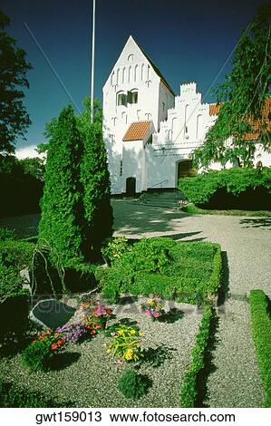 Cemetery in front of a church, Funen County, Denmark View Large Photo Image Stock Image - Cemetery in front of a church, Funen County, Denmark. Fotosearch