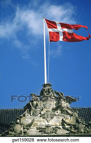 Danish flag fluttering on a sculpture, Amalienborg Palace, Copenhagen, Denmark View Large Photo Image Stock Photo - Danish flag fluttering on a sculpture, Amalienborg Palace, Copenhagen, Denmark. Fotosearch