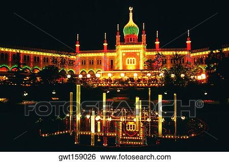 Facade of a mosque lit up at night, Tivoli Gardens, Copenhagen, Denmark View Large Photo Image Stock Photograph - Facade of a mosque lit up at night, Tivoli Gardens, Copenhagen, Denmark. Fotosearch