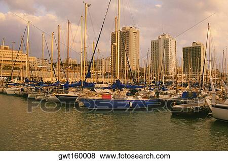 Boats docked at a harbor, Tel Aviv, Israel View Large Photo Image Stock Photo - Boats docked at a harbor, Tel Aviv, Israel. Fotosearch