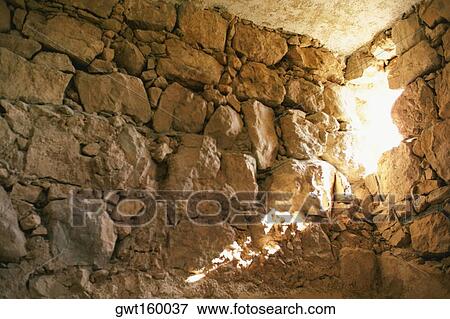 Low angle view of a hole in a stone wall, Masada, Israel View Large Photo Image Stock Photo - Low angle view of a hole in a stone wall, Masada, Israel. Fotosearch