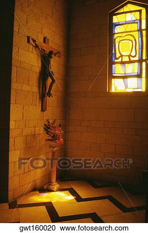 Statue of Jesus Christ on a wall with a flower vase on the floor in a basilica, Basilica Of The Annunciation, Nazareth, Israel View Large Photo Image Stock Image - Statue of Jesus Christ on a wall with a flower vase on the floor in a basilica, Basilica Of The Annunciation, Nazareth, Israel. Fotosearch