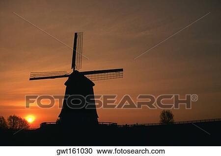 Silhouette of a traditional windmill at dusk, Schermer, Netherlands View Large Photo Image Stock Image - Silhouette of a traditional windmill at dusk, Schermer, Netherlands. Fotosearch