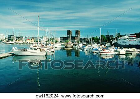 Boats moored at a harbor, Oslo, Norway View Large Photo Image Picture - Boats moored at a harbor, Oslo, Norway. Fotosearch