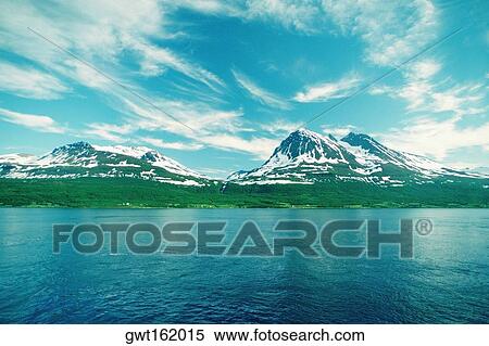 Mountains at the waterfront, North Cape, Norway View Large Photo Image Stock Photography - Mountains at the waterfront, North Cape, Norway. Fotosearch