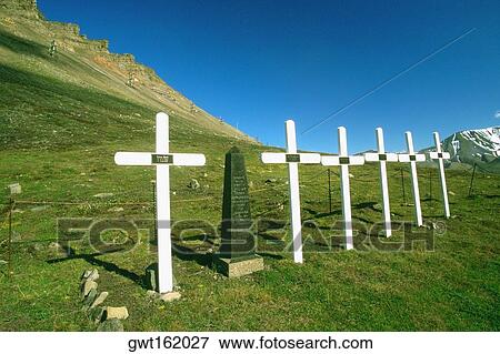 Stock Photo - Row of graves on a landscape, Norway. Fotosearch