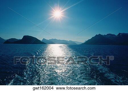 Sun shining over the sea, Lofoten Islands, Norway View Large Photo Image Picture - Sun shining over the sea, Lofoten Islands, Norway. Fotosearch