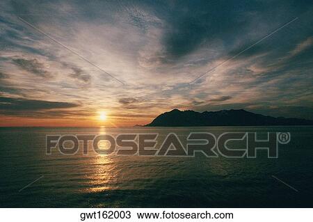 Stock Image - Sunset at dusk, Lofoten Islands, Norway. Fotosearch