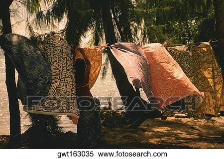 Clothes drying on a clothesline, Bora Bora, Society Islands, French Polynesia View Large Photo Image Stock Photography - Clothes drying on a clothesline, Bora Bora, Society Islands, French Polynesia. Fotosearch