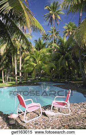 High angle view of two armchairs at the poolside, Fiji View Large Photo Image Stock Photography - High angle view of two armchairs at the poolside, Fiji. Fotosearch