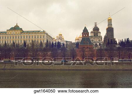Buildings at the waterfront, Bell tower of Ivan The Great, Kremlin, Moscow, Russia View Large Photo Image Stock Image - Buildings at the waterfront, Bell tower of Ivan The Great, Kremlin, Moscow, Russia. Fotosearch