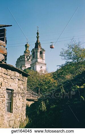 Low angle view of an overhead cable car near a church, Tbilisi, Georgia View Large Photo Image Stock Photography - Low angle view of an overhead cable car near a church, Tbilisi, Georgia. Fotosearch
