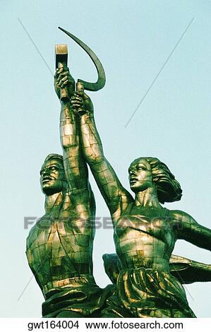 Low angle view of statues, Statue Of Farm Workers, Moscow, Russia View Large Photo Image Picture - Low angle view of statues, Statue Of Farm Workers, Moscow, Russia. Fotosearch