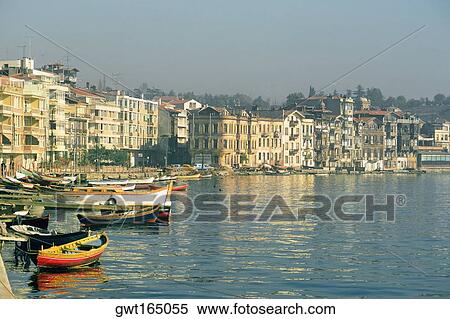Boats moored at a harbor with buildings at the waterfront, Istanbul, Turkey View Large Photo Image Stock Photography - Boats moored at a harbor with buildings at the waterfront, Istanbul, Turkey. Fotosearch