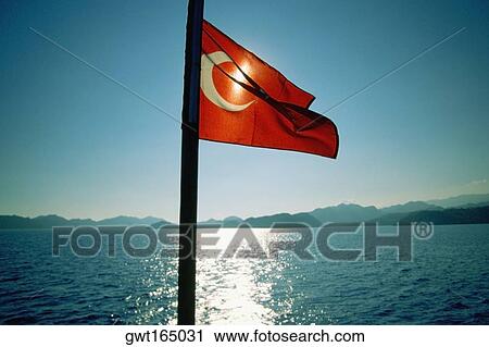 Close-up of a Turkish flag fluttering on a cruise ship, Kekova, Antalya, Turkey View Large Photo Image Stock Image - Close-up of a Turkish flag fluttering on a cruise ship, Kekova, Antalya, Turkey. Fotosearch