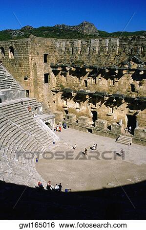 High angle view of tourists in an amphitheater, Aspendos, Turkey View Large Photo Image Stock Photograph - High angle view of tourists in an amphitheater, Aspendos, Turkey. Fotosearch