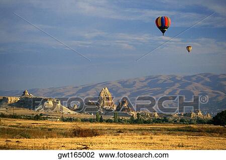 Hot air balloons in the sky, Uchisar, Cappadocia, Turkey View Large Photo Image Stock Image - Hot air balloons in the sky, Uchisar, Cappadocia, Turkey. Fotosearch