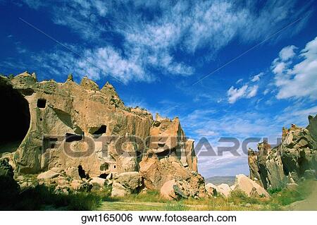 Low angle view of a cave dwelling, Zelve Valley, Cappadocia, Turkey View Large Photo Image Stock Photograph - Low angle view of a cave dwelling, Zelve Valley, Cappadocia, Turkey. Fotosearch